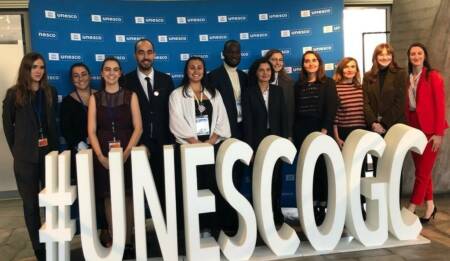 Youth with UNESCO sign